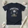 Navy t-shirt featuring "CAYMAN ISLANDS Est. 1503 Caribbean" text with a palm tree graphic inside a circle