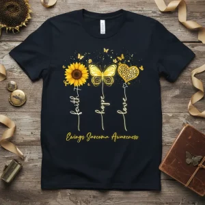 Faith Hope Love Ewings Sarcoma Awareness t-shirt with sunflower, butterfly, and heart graphic. Yellow ribbon detail included